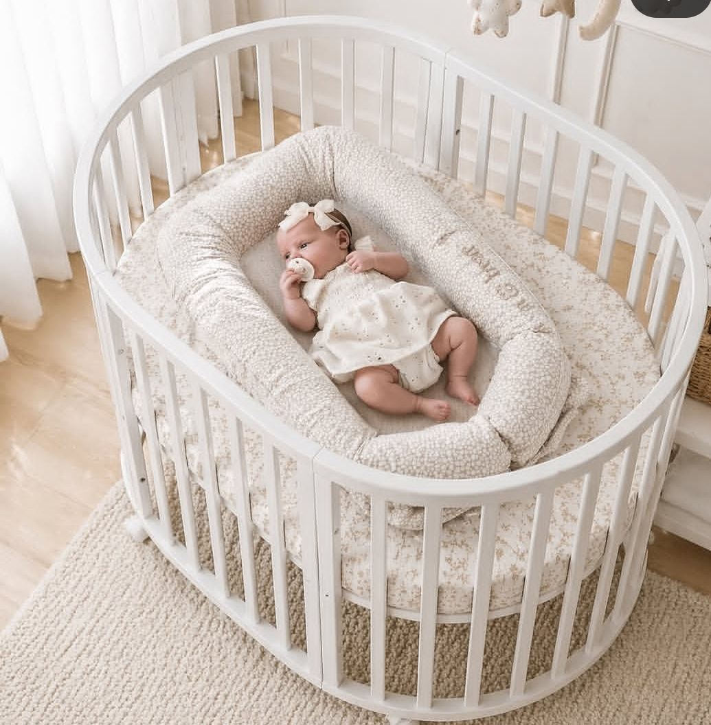 The Cuddler 5-in-1 Oval Cot
