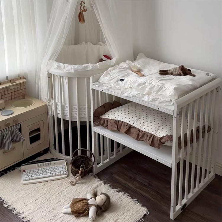 The Cuddler 5-in-1 Oval Cot